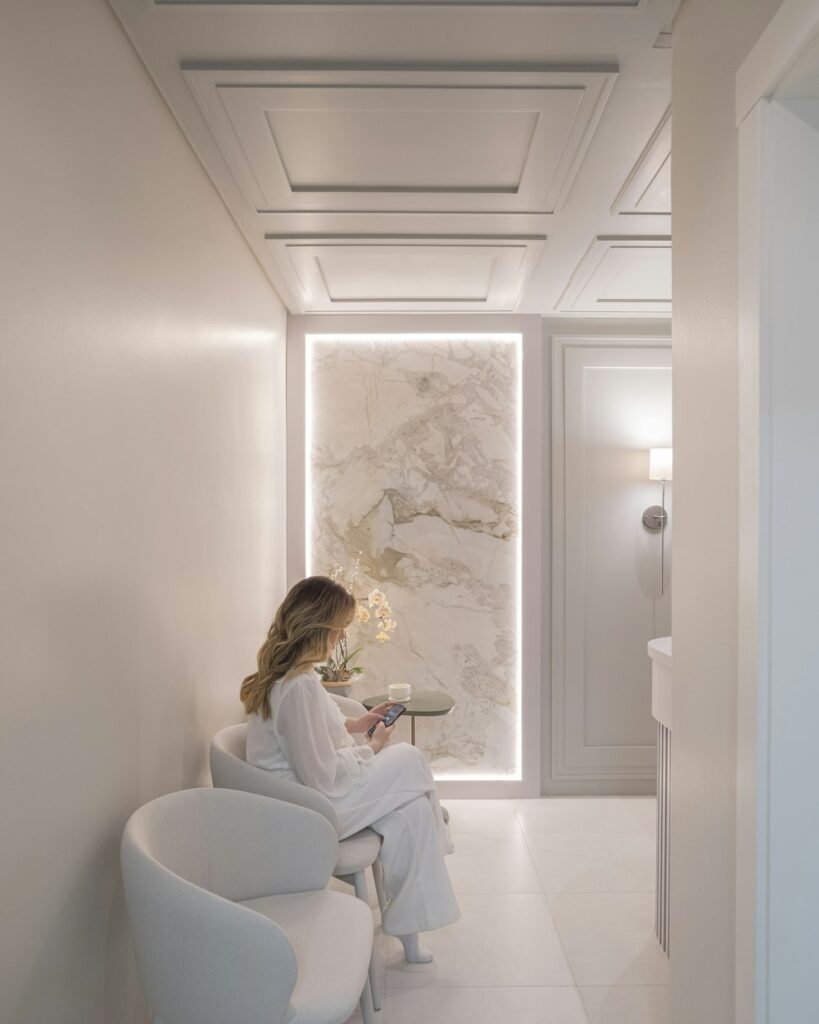 Patient relaxing in a quiet, light-filled waiting area